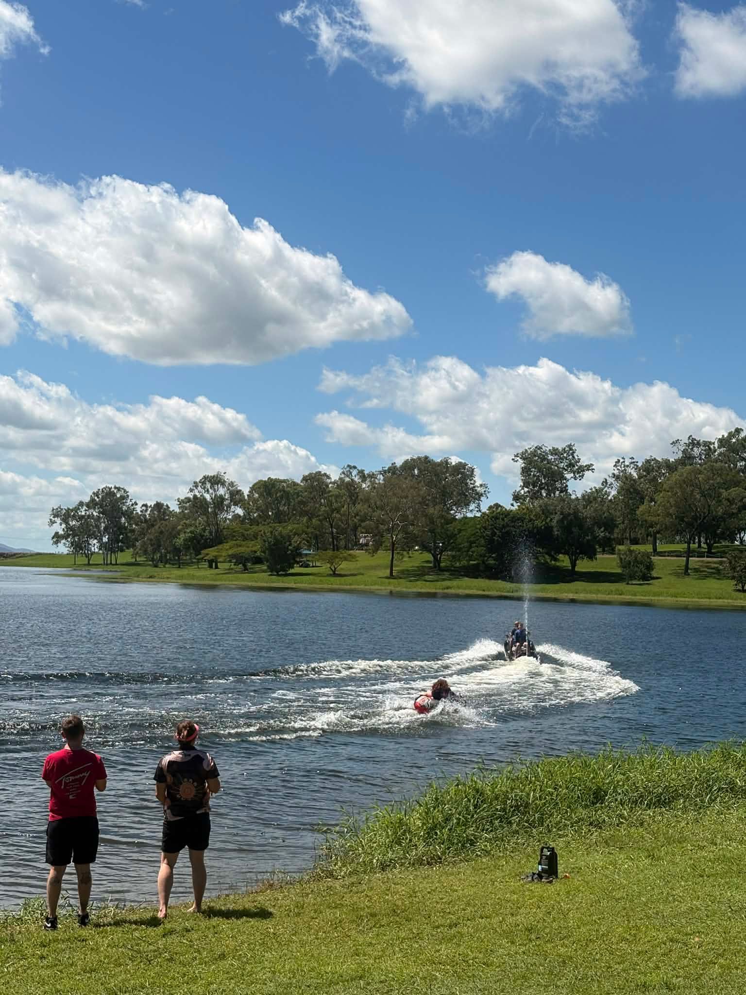 A Group Of People Are Sitting In A Circle Talking To A Man — Advanced Therapy Mackay In Mackay, QLD 