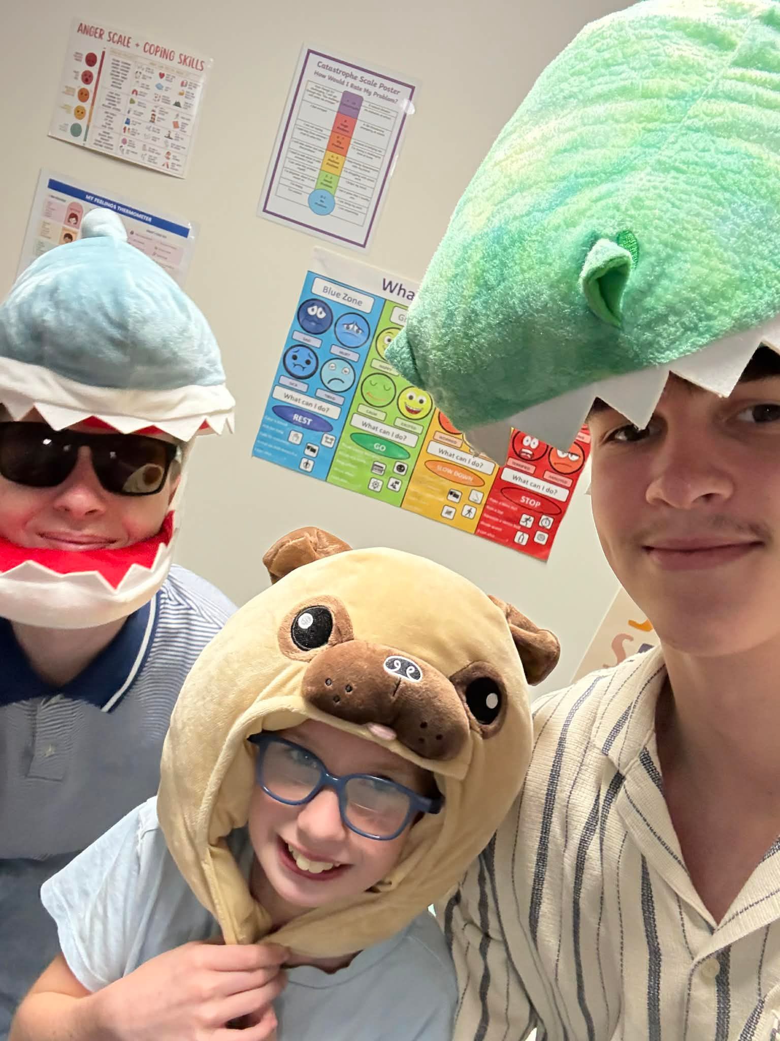 Two Men Are Washing Dishes In A Kitchen Sink — Advanced Therapy Mackay In Mackay, QLD 