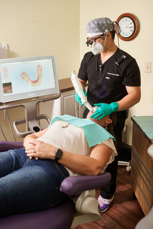 Dentist in Clemmons NC showing patient dental sculpture