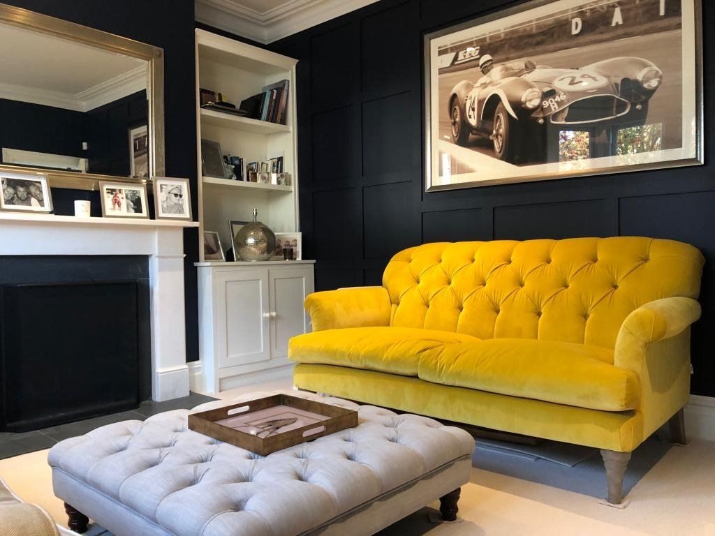 Living room with yellow sofa