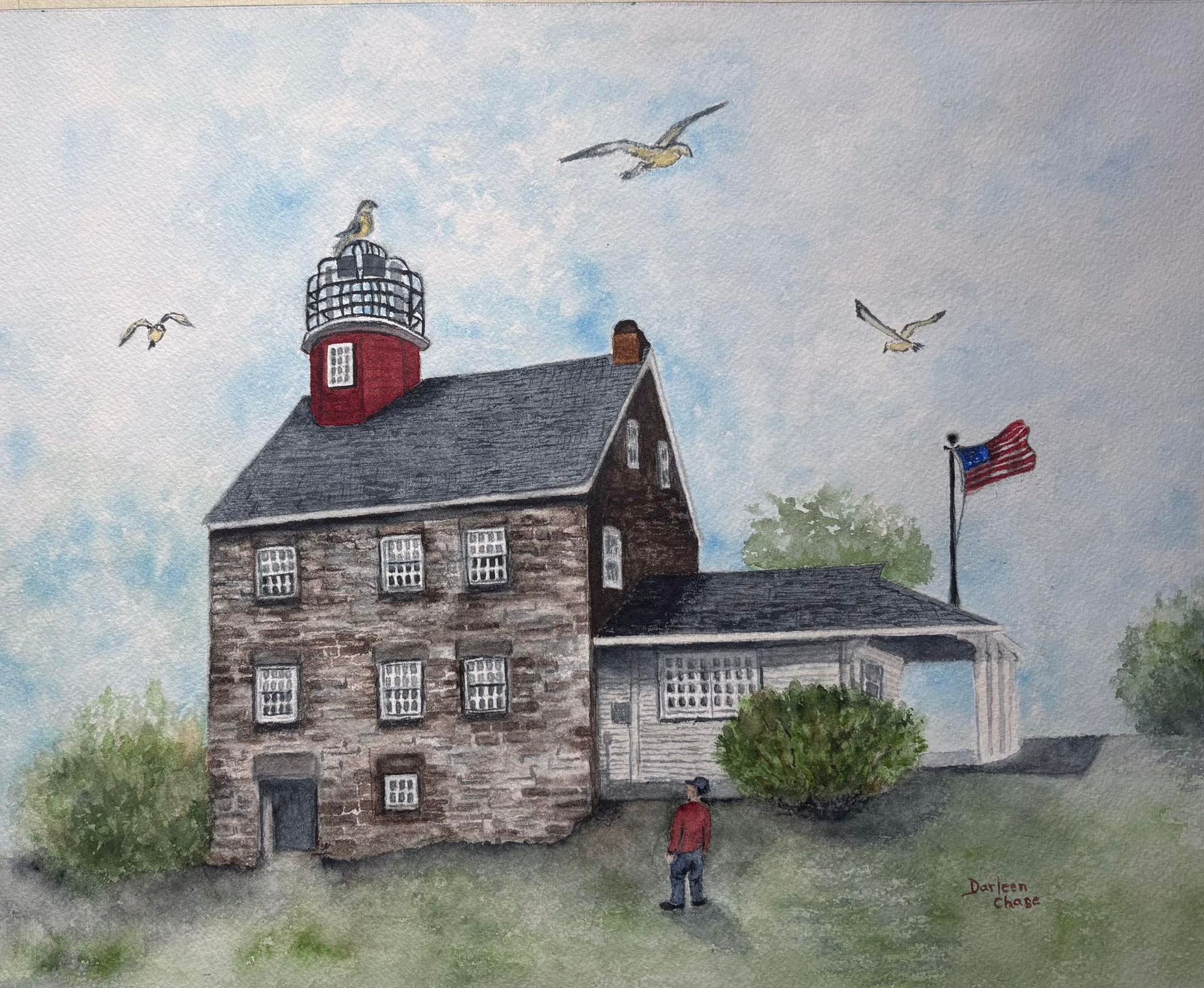 Watercolor lighthouse building by the sea with birds, a U.S. flag, and a person standing outside.
