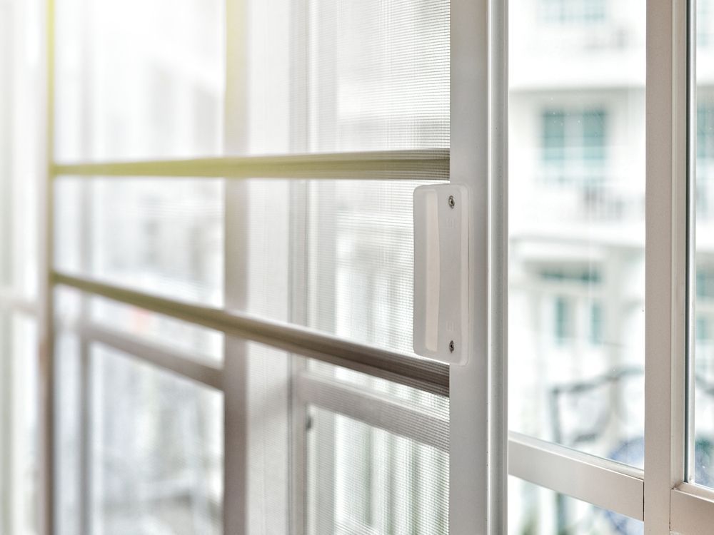 Mosquito Wire Screen on White Window — Coastal Screens & Glass in Wauchope, NSW