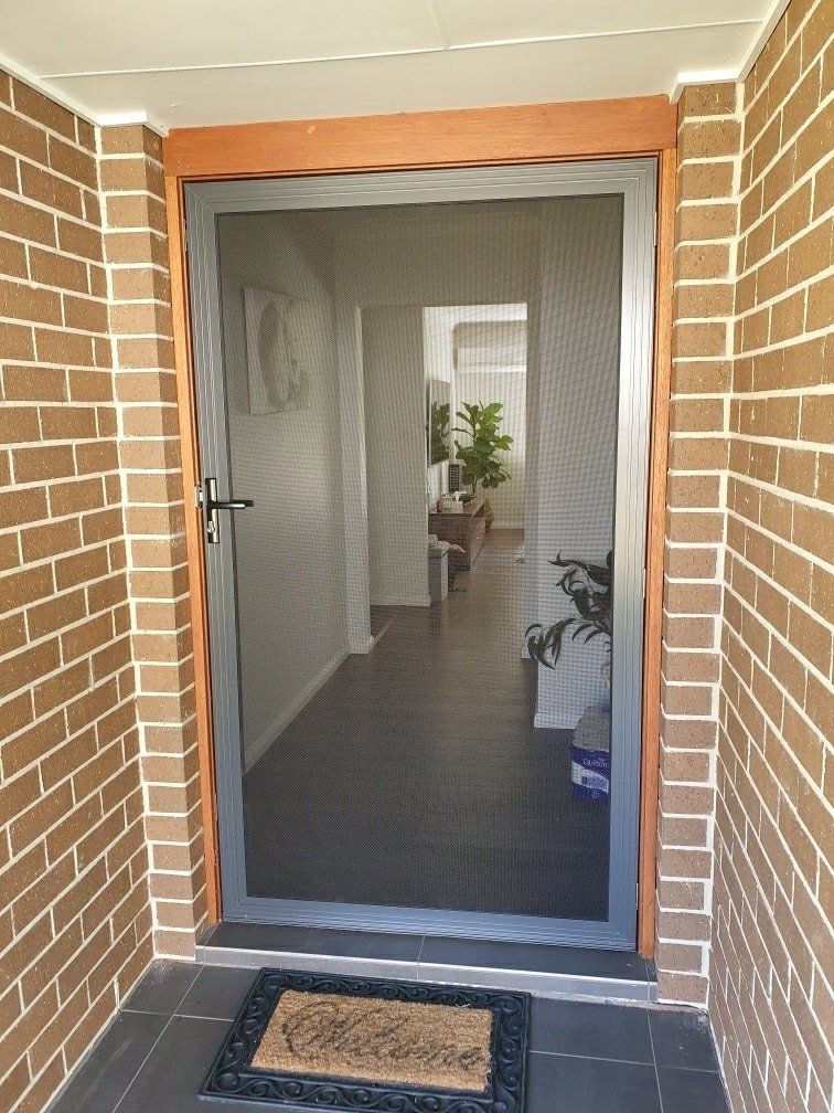 Door Security Screen — Coastal Screens & Glass in Port Macquarie, NSW