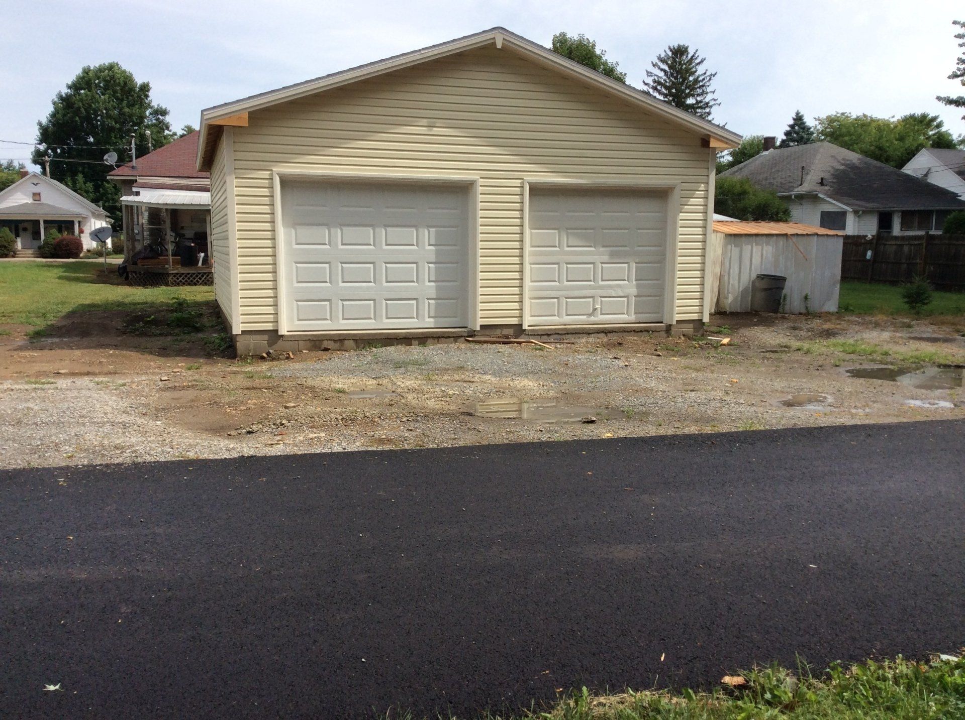 Clean White Garage — New Carlisle, OH — Fincel Lawn Care