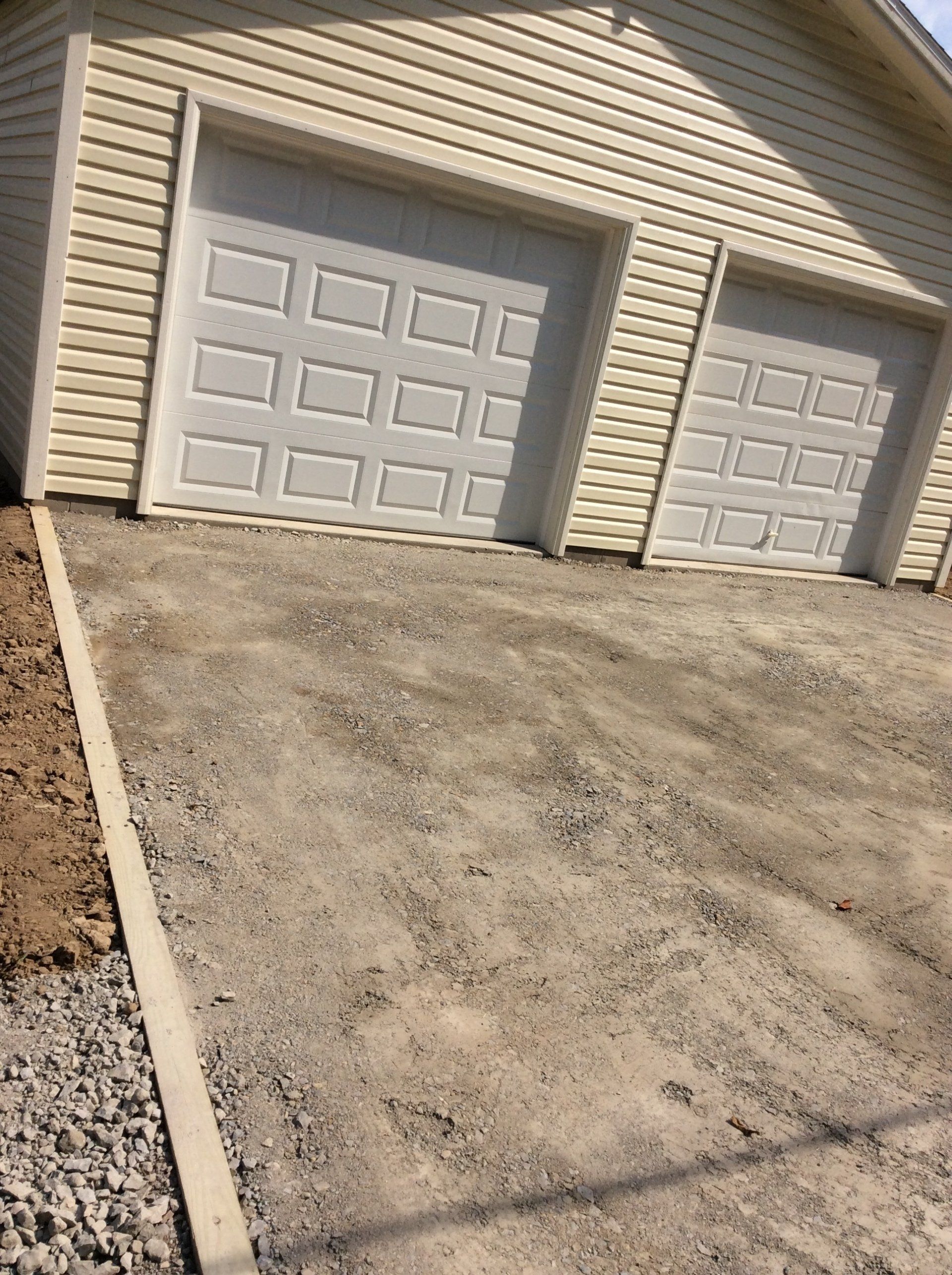 Clean Garage Door And Drive Way — New Carlisle, OH — Fincel Lawn Care
