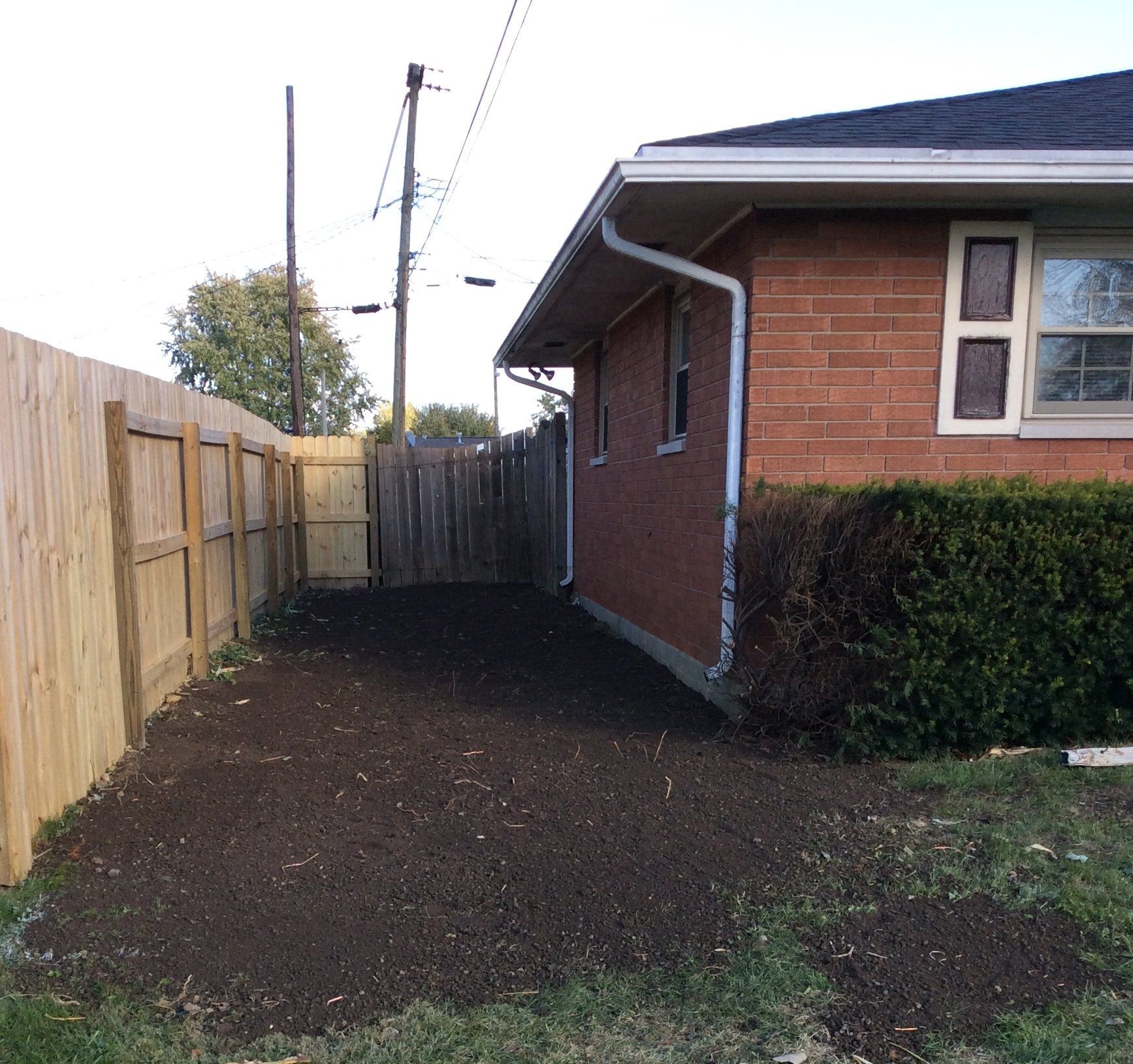 House Backyard With Mulch — New Carlisle, OH — Fincel Lawn Care