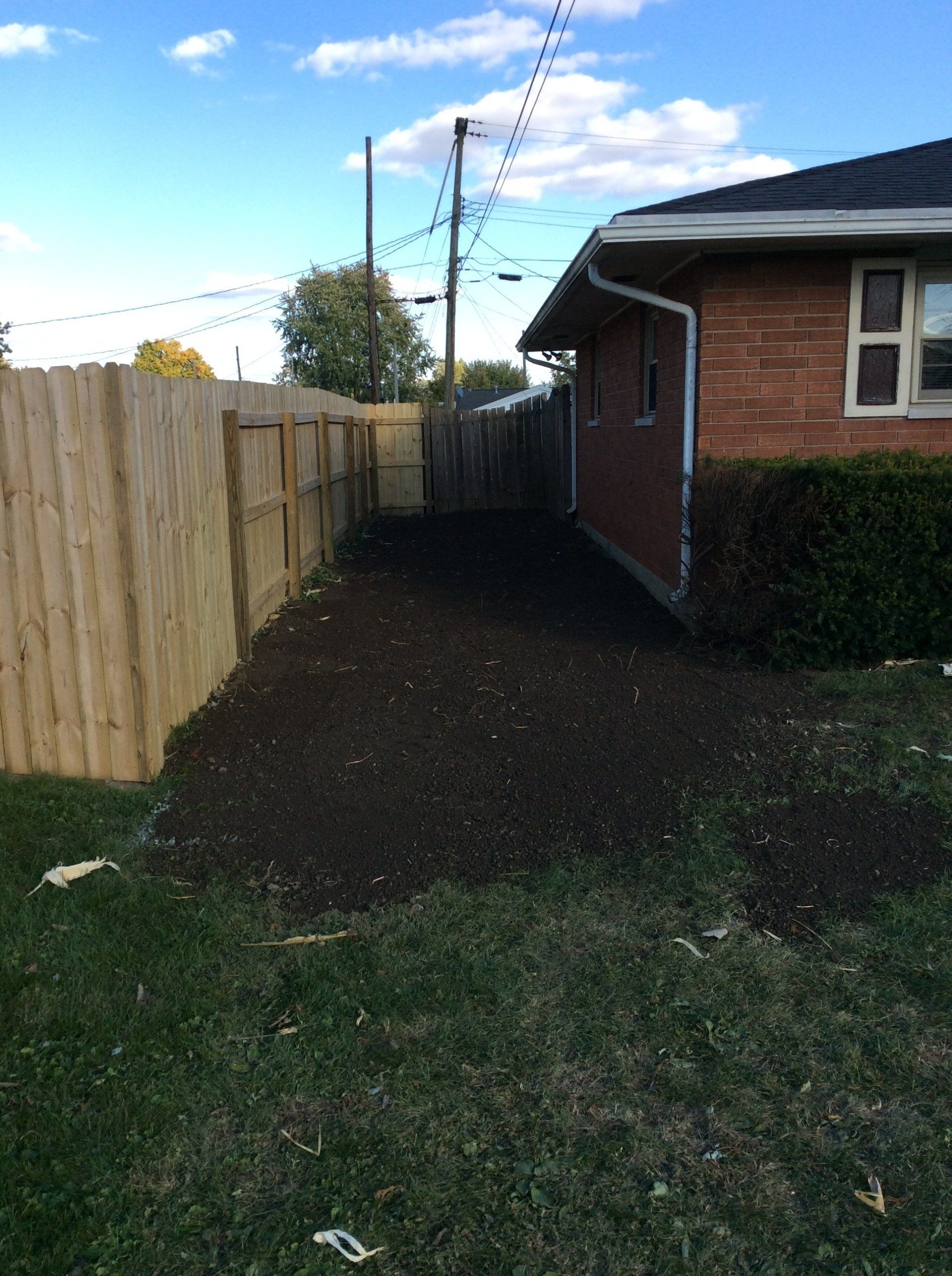 Backyard With Mulch Spread — New Carlisle, OH — Fincel Lawn Care