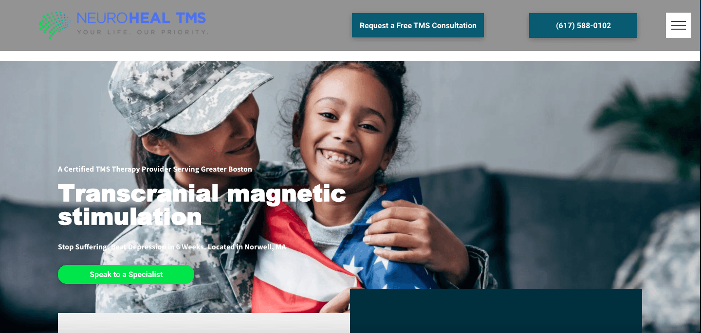 A woman in a military uniform is holding a little girl in her arms.