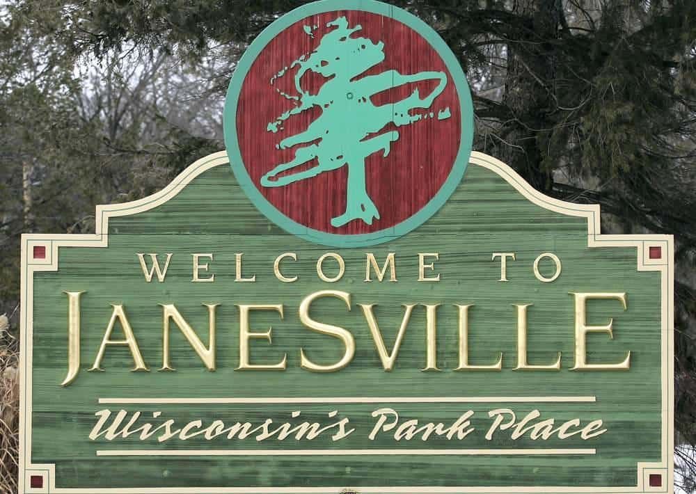 A welcome sign for janesville wisconsin 's park place