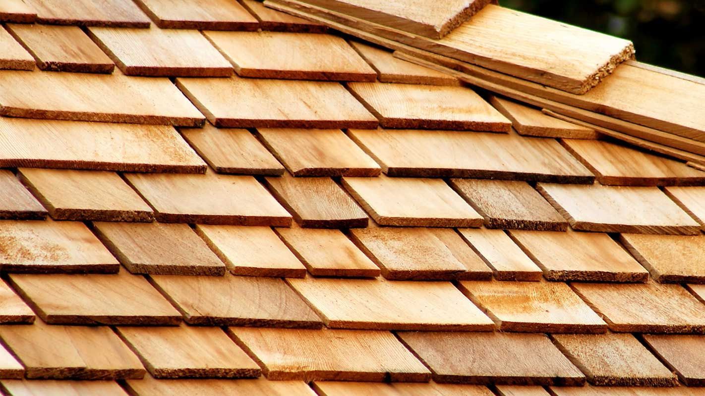 A close up of a wooden shingle roof