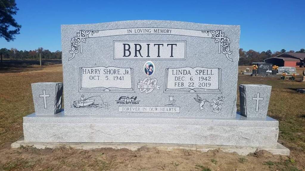 a gravestone for britt is in a cemetery .