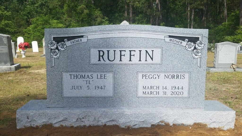 a gravestone for ruffin in a cemetery