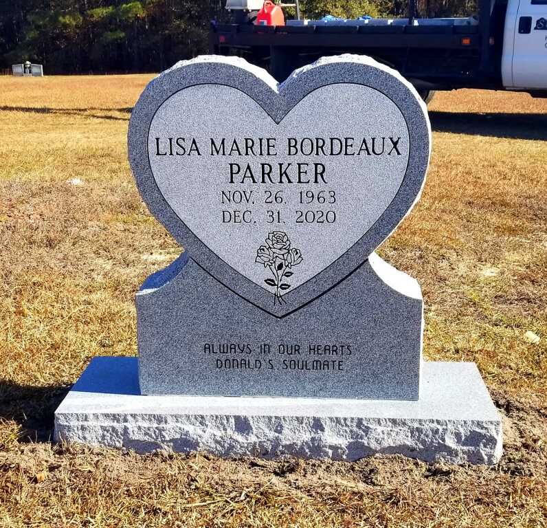 a heart shaped gravestone for lisa marie bordeaux parker