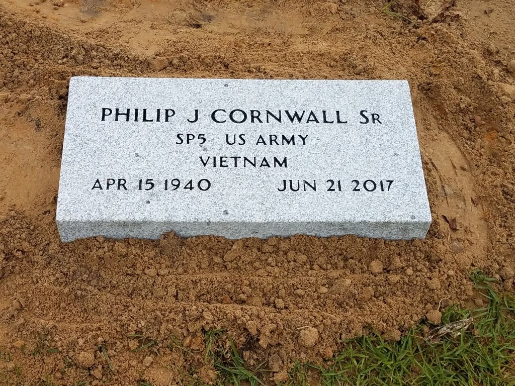 a gravestone for philip j cornwall sr of the us army in vietnam .