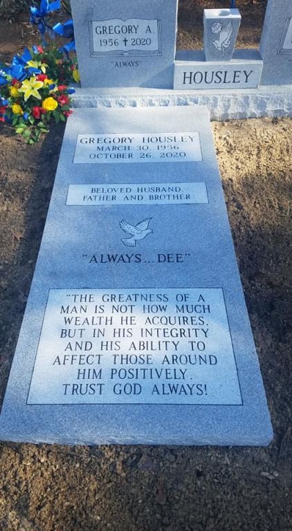 a grave with a quote on it that says 