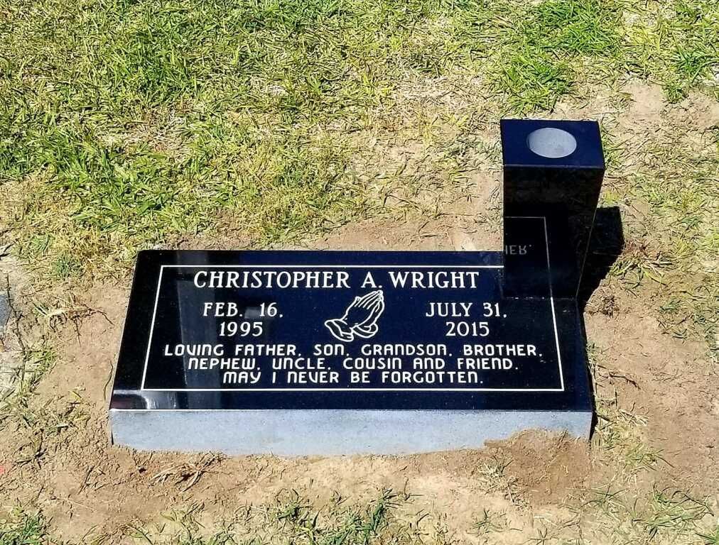 a gravestone for christopher a wright who died on july 31 2015