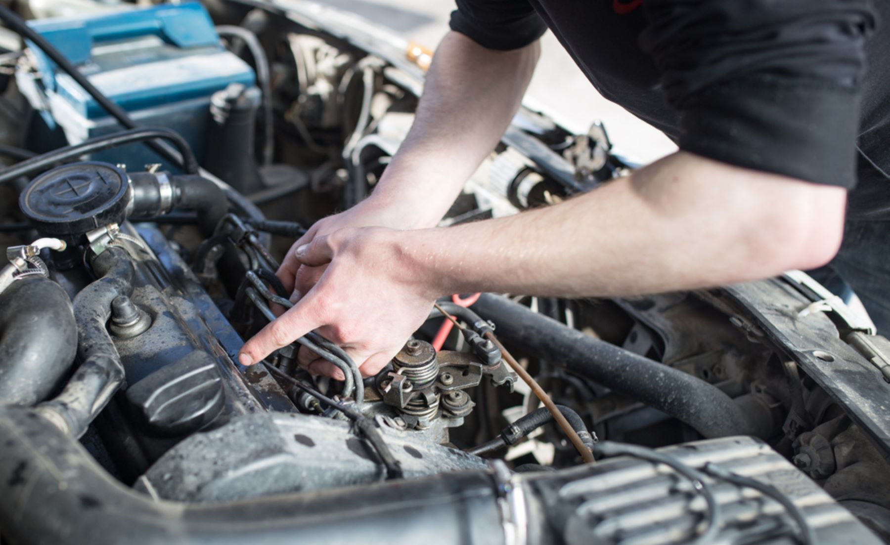 A Man is Working on the Engine of a Car — Alstonville Rego & Mechanical in Alstonville, NSW