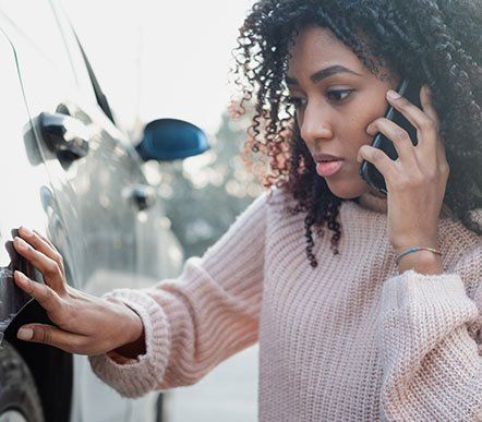 Auto Accident Lawyers — Woman Calling Help in Milwaukee, WI