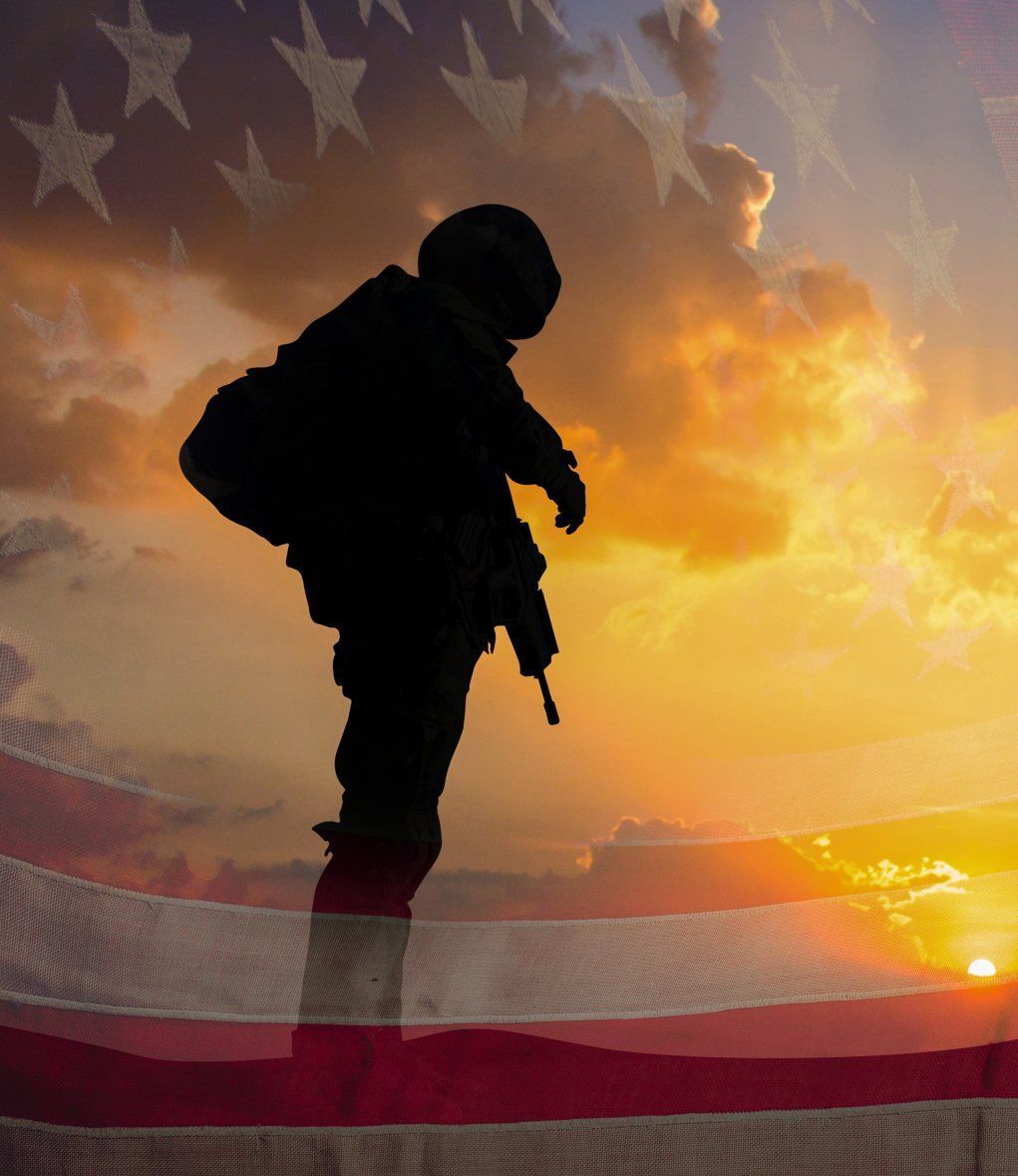 American veteran in uniform with american flag background