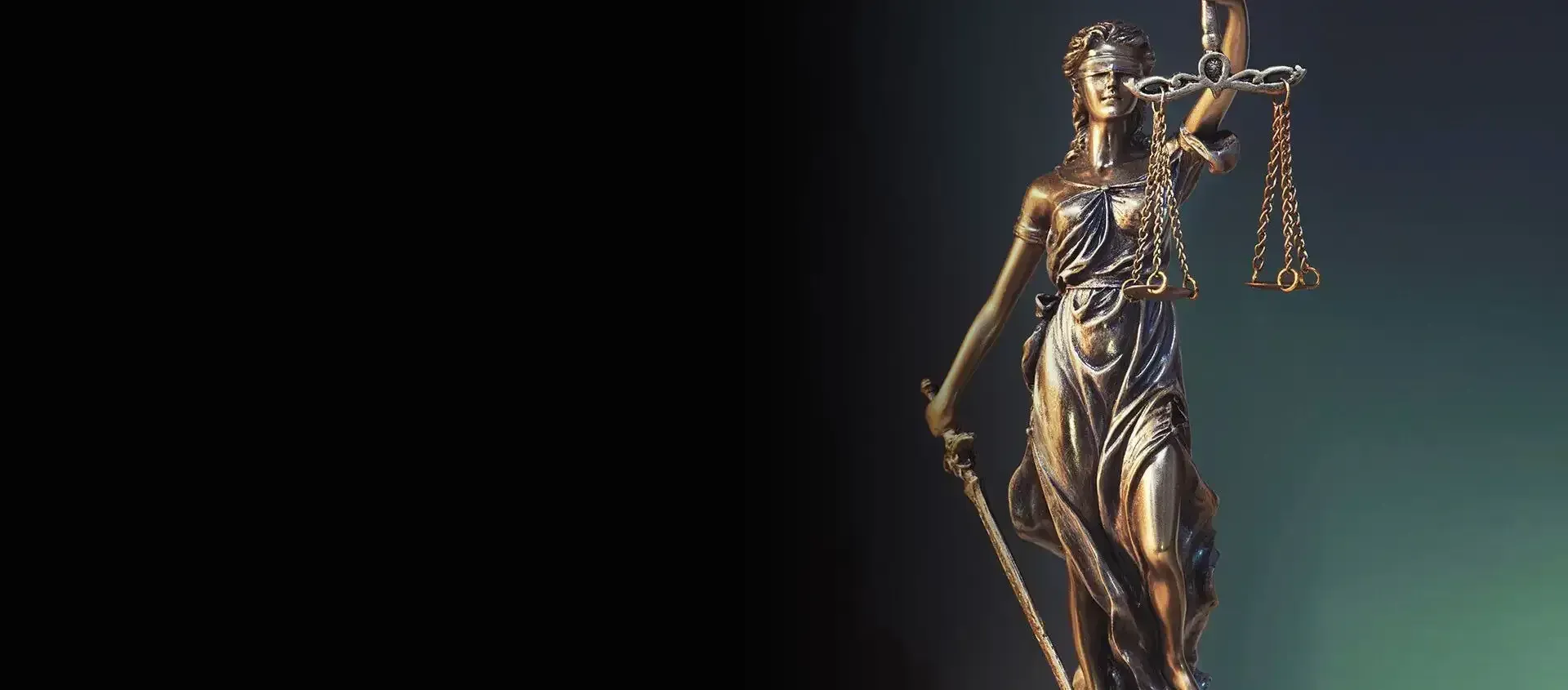 A Statue of Justice is Holding a Scale and a Sword — Olympus Lawyers In Ballarat Central, VIC