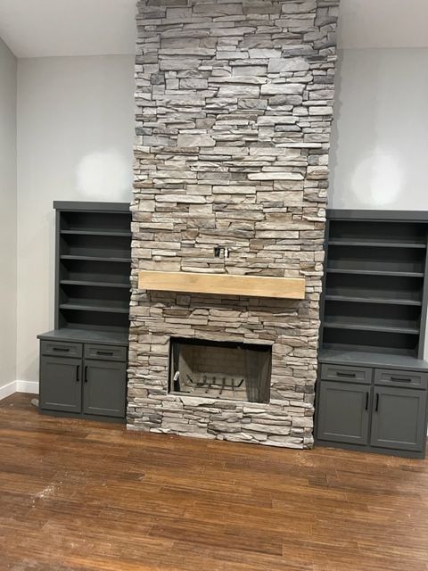 rock fireplace built in bookshelf
