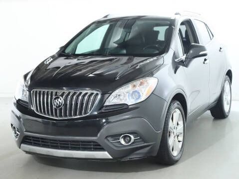 Black Buick Encore SUV, front view, outdoors.