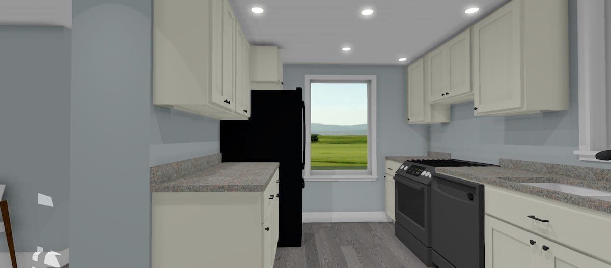 Modern kitchen with white cabinets, gray countertops, and a window overlooking green fields.