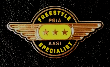 A badge that says freestyle psia aasi specialist