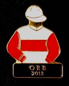 A pin that says orb 2013 on it