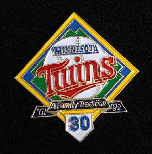 A minnesota twins pin with the number 30 on it