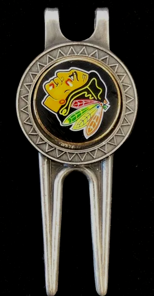 A golf ball marker with a blackhawks logo on it.