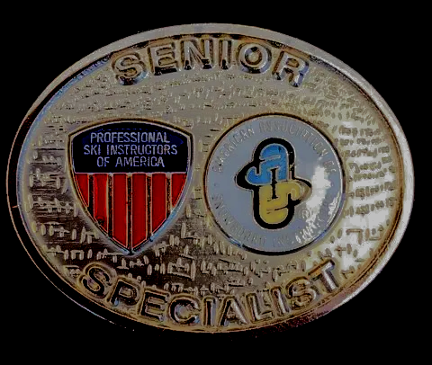 A gold coin that says senior specialist on it