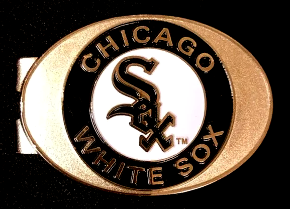 A chicago white sox belt buckle with a black and white logo