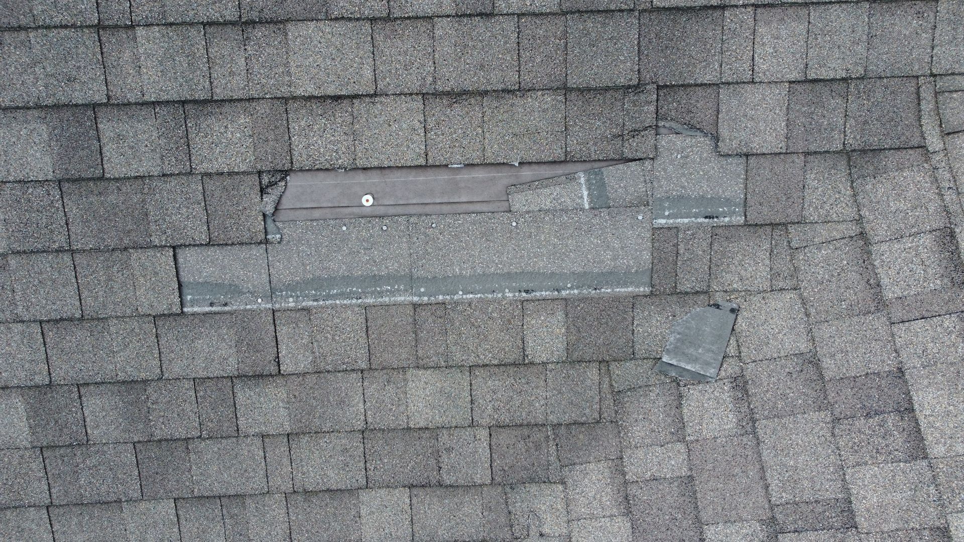 Close up of roof with missing shingles
