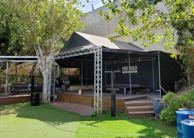 The bar has been tarped to protect from the rain