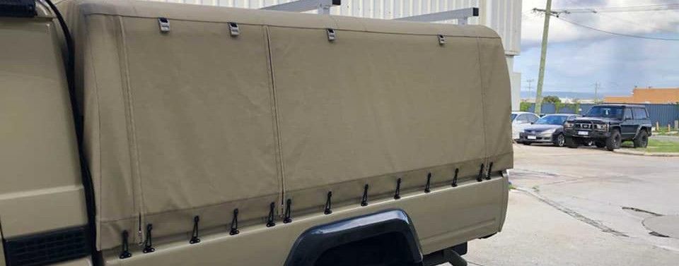 Custom-designed and installed truck canopy for a rugged look.