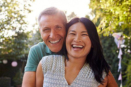 middle age couple smiling cosmetic dentistry | Teeth Whitening Wellington