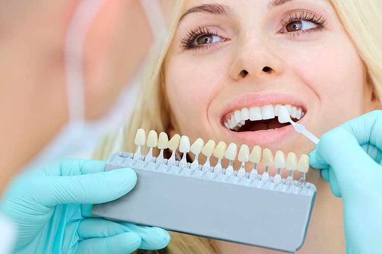 woman at the dentist | dental bonding | Dental Implants Wellington