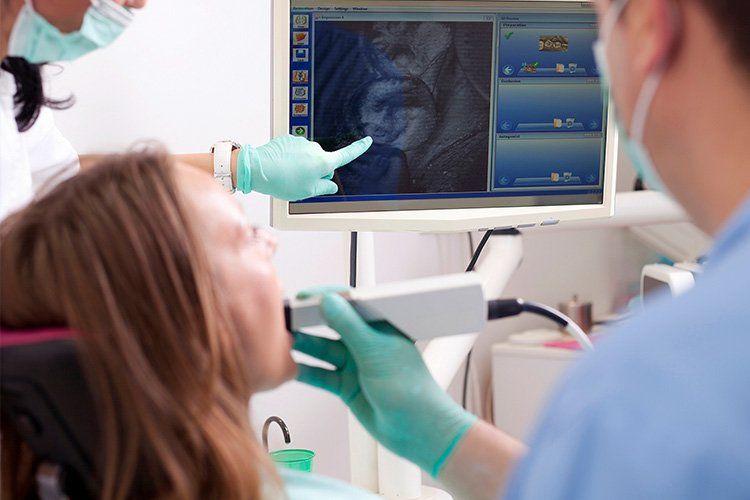 woman at the dentist, oral surgery services