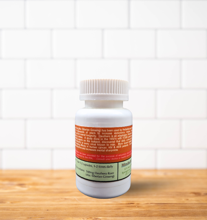 A bottle of pills is sitting on a wooden table.