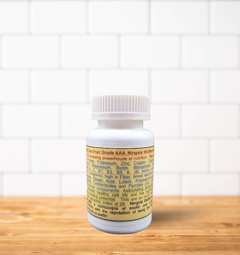 A bottle of pills is sitting on a wooden table.