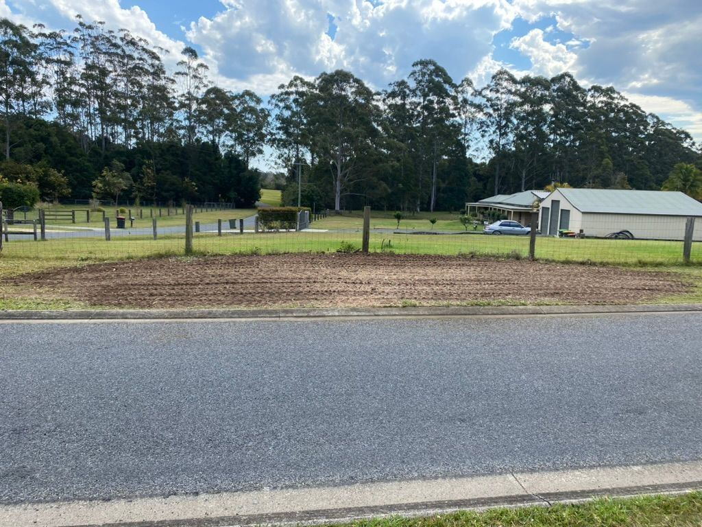 A Road in Front of a Field With Brown Soil, Wooden Fence, and Trees — MNC Trees in Kempsey, NSW