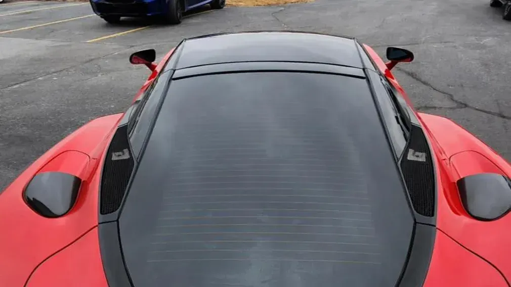 window tinting on a red car