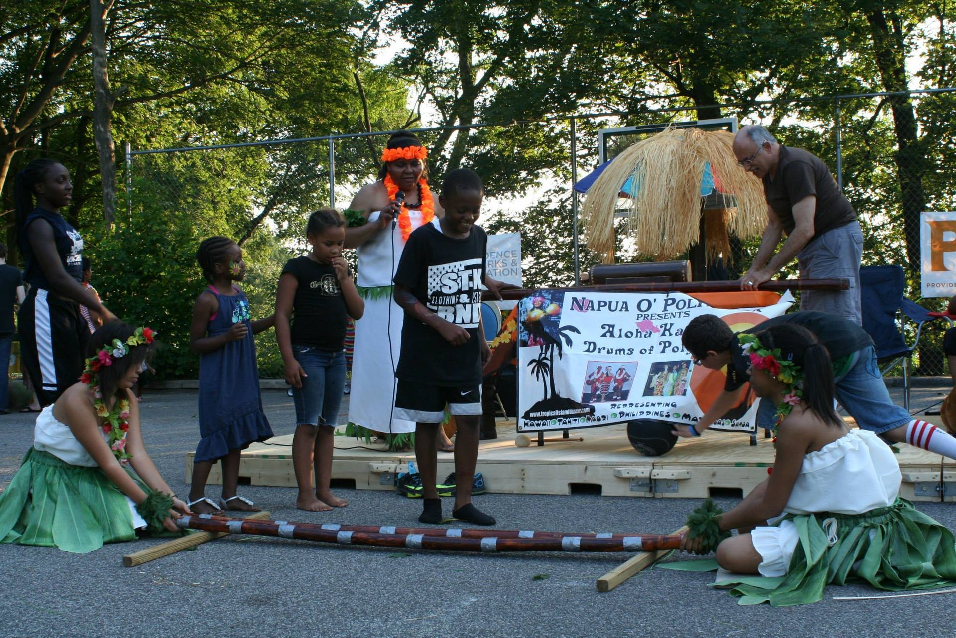 A person trying to learn to a cultural dance.
