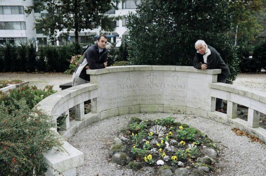 Julien and Daniel upon the grave of Maria Montessori in Noordwijk aan Zee, The Netherlands.