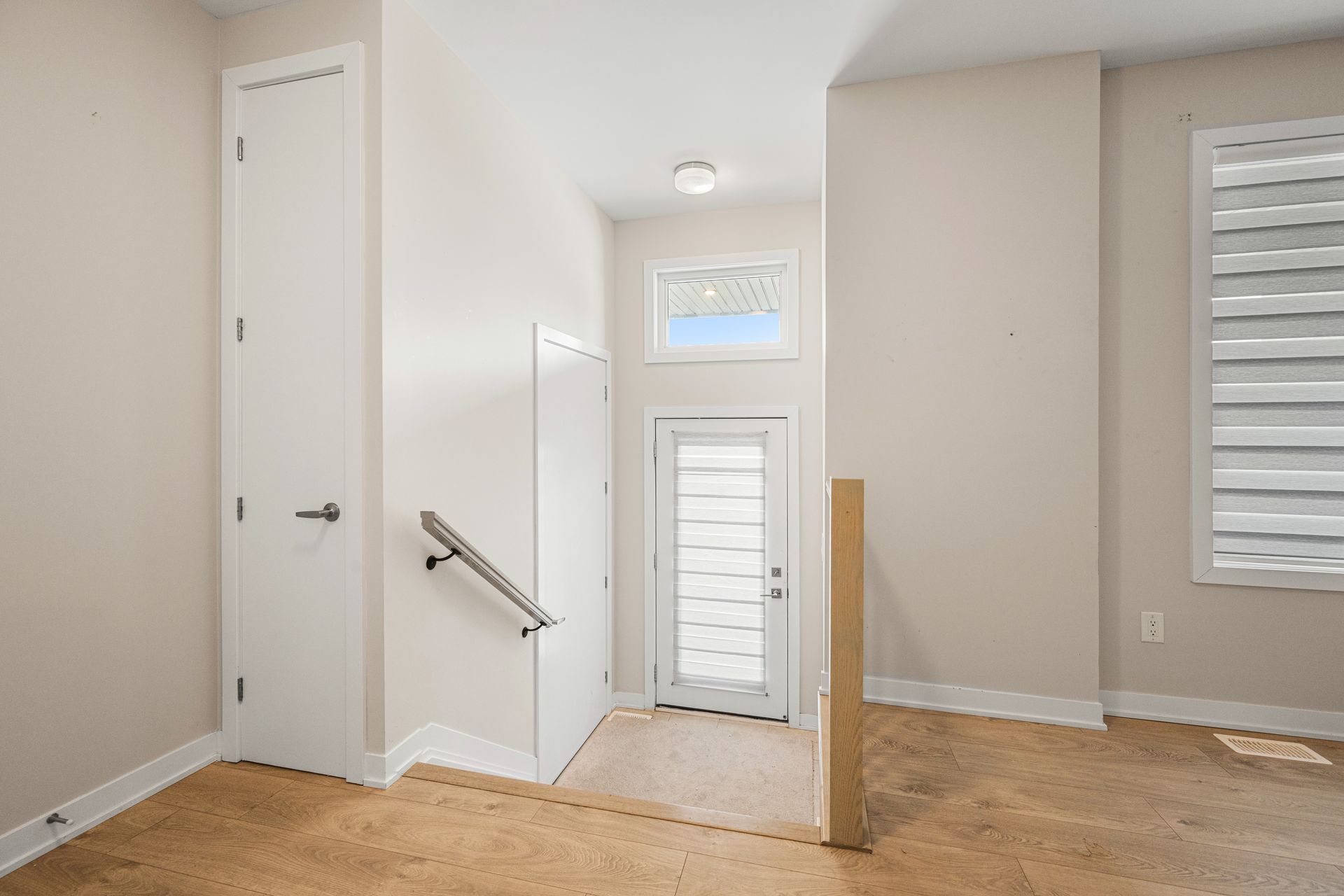 There is a staircase leading up to the second floor of the house.