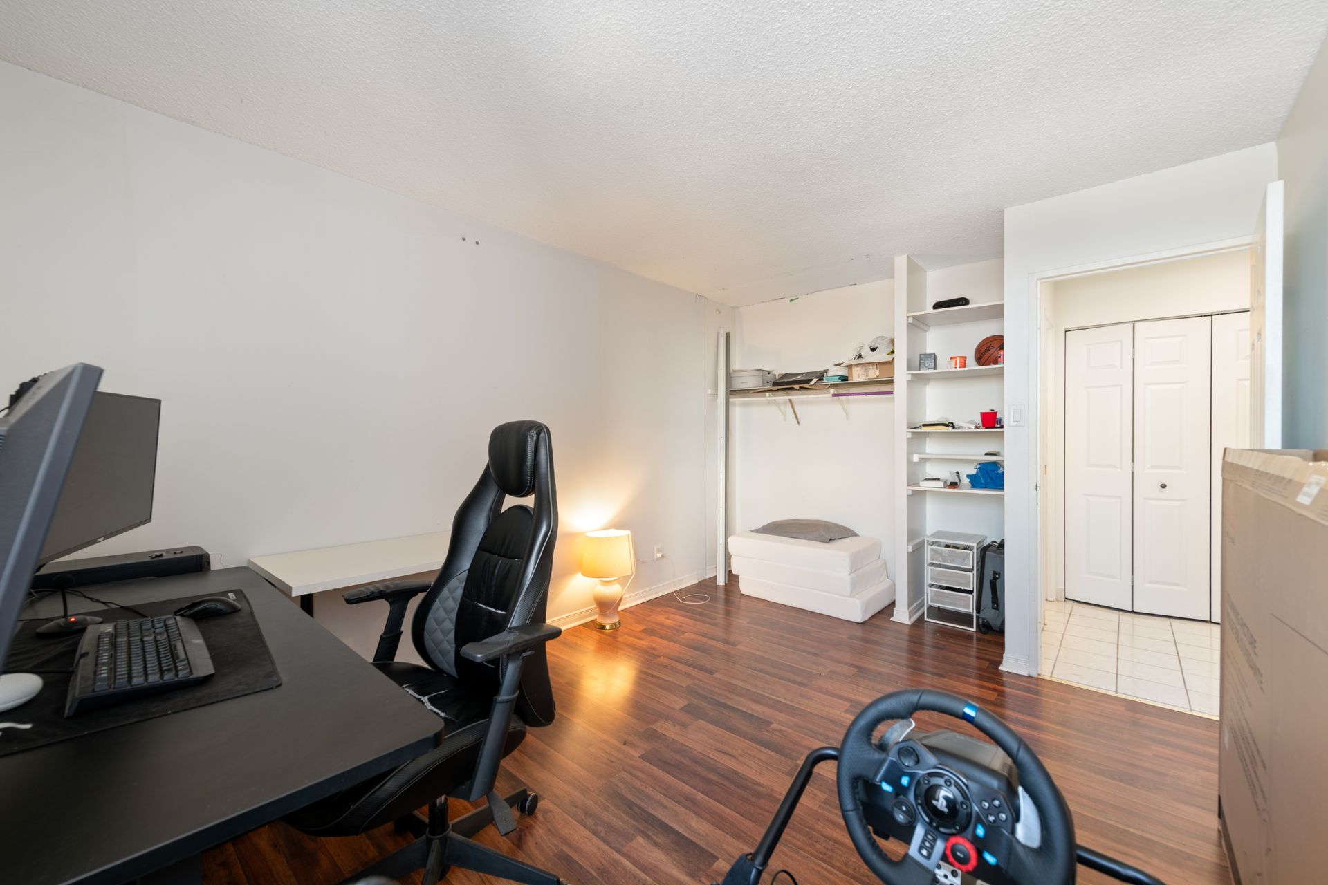 There is a steering wheel in the middle of the room.