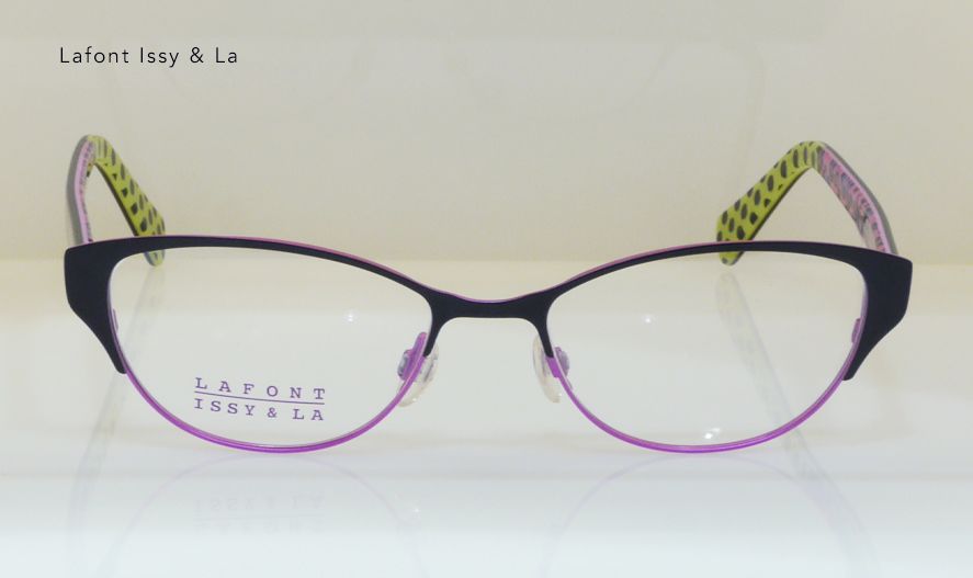 Black cat-eye glasses with decorative trim and clear lenses, on a reflective surface.
