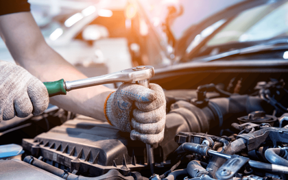 a mechanic doing an auto repair