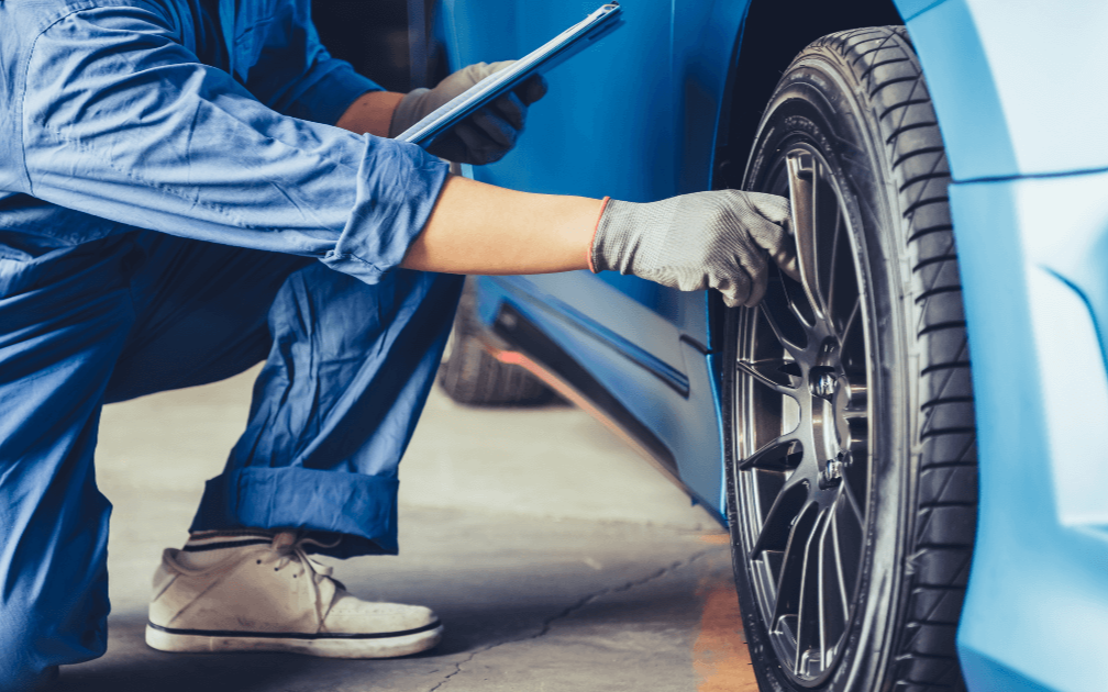 a mechanic doing a pre-purchase inspection